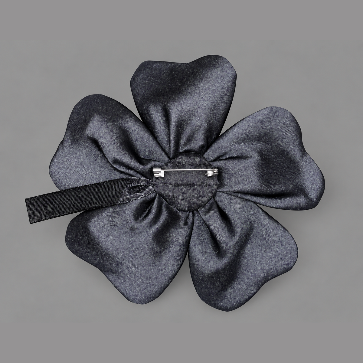 Flower brooch in black satin