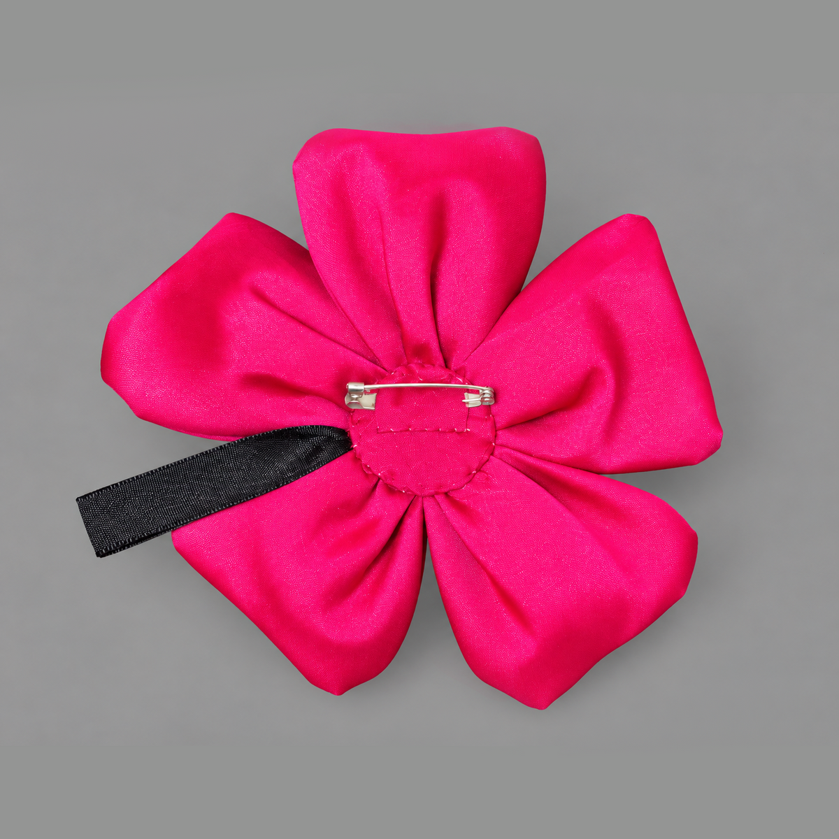 Flower brooch in shocking pink satin